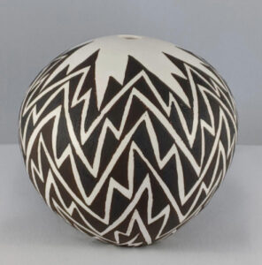 Dolores Lewis Garcia's black and white clay seed pot