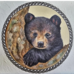 Doris John's Bear Cub acyrlic painting on rough paper with round patterned edge